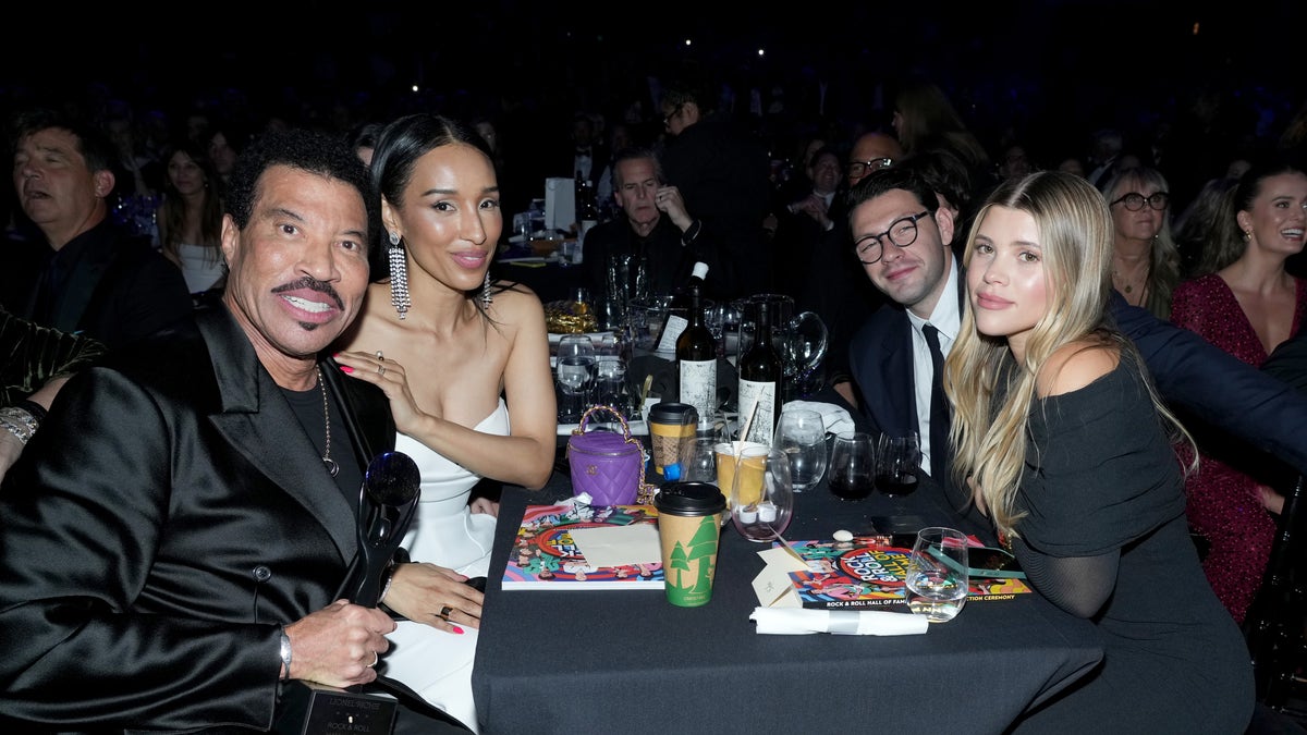 Sofia Richie with her fiancé Elliot Graine and her father Lionel Richie and his girlfriend Lisa Parigi at the Rock & Roll Hall of Fame Induction