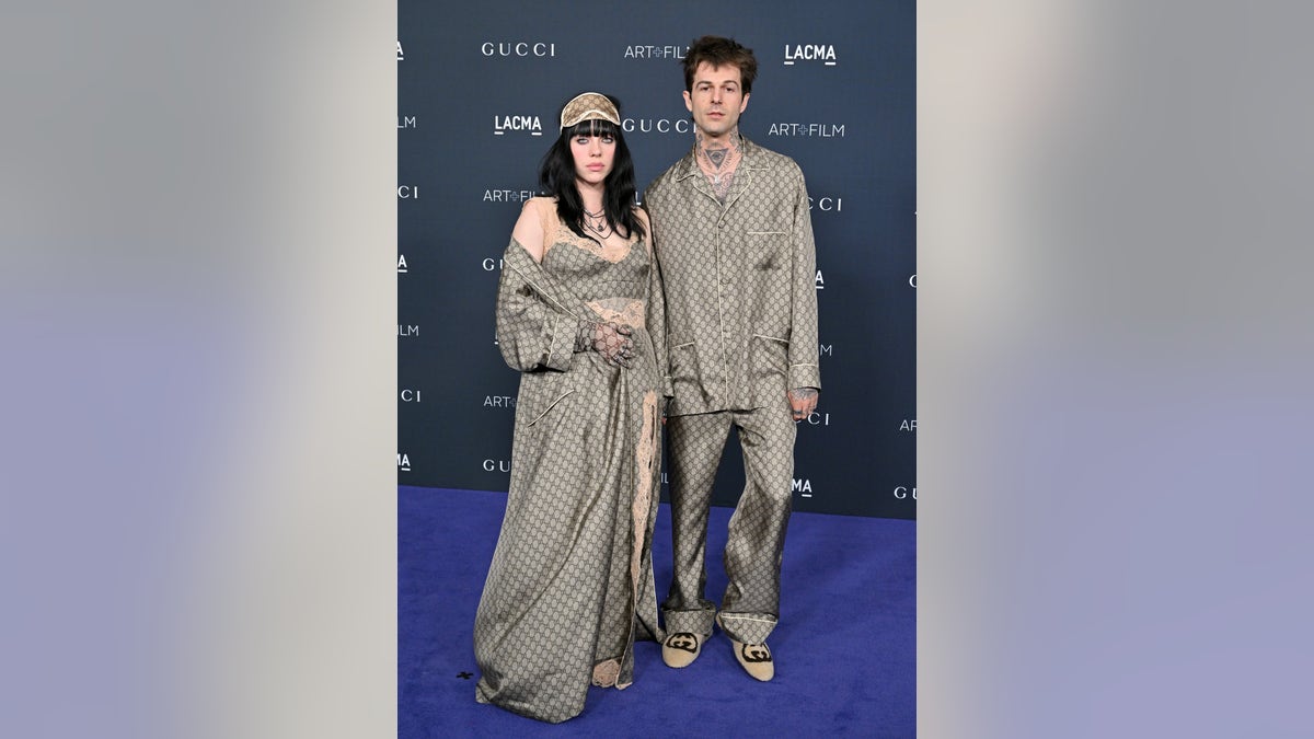 Billie Eilish, who is regularly photographed in Gucci, wears a Gucci outfit alongside boyfriend Jesse Rutherford