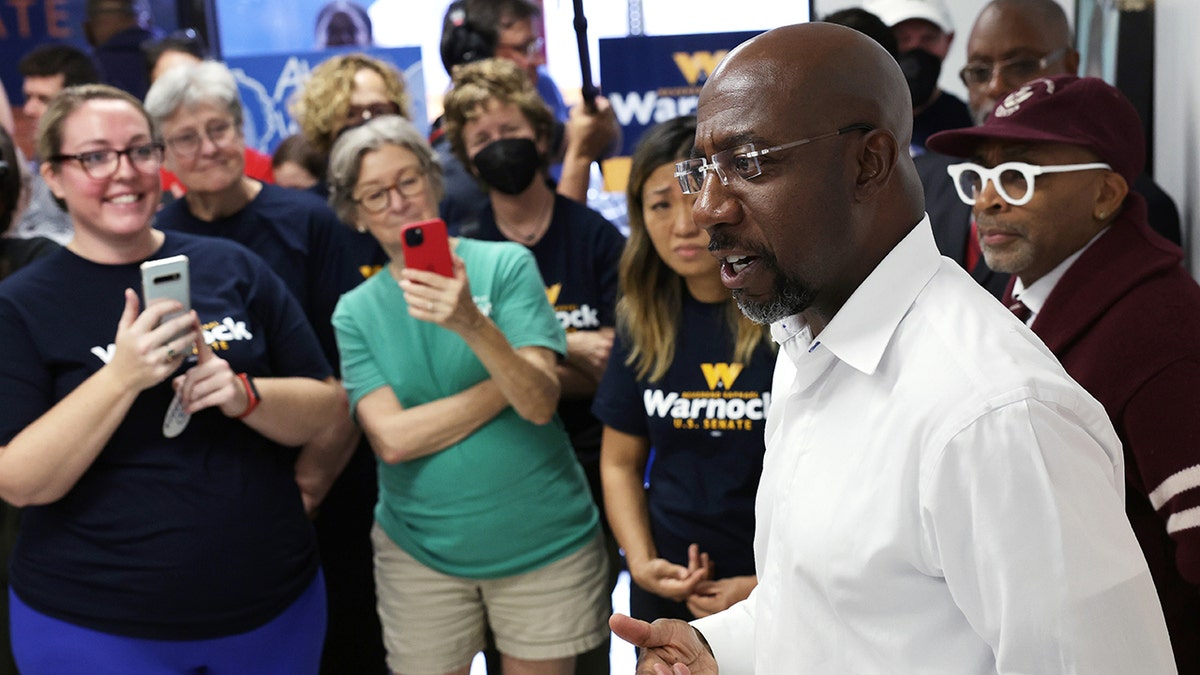 Warnock speaks to supporters before election day