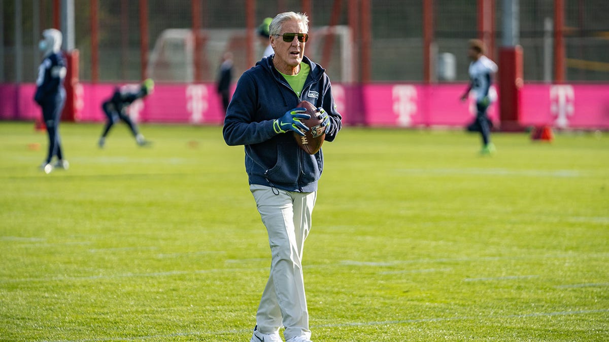Pete Carroll on the practice field in Germany