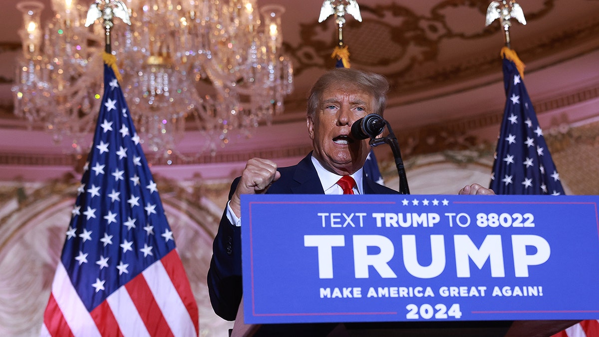 A photo of Donald Trump speaking behind a podium