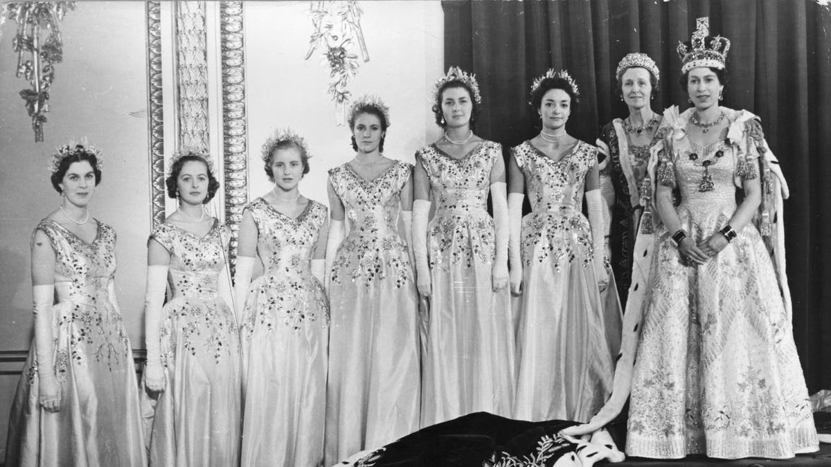 Queen Elizabeth on her coronation date with her Maids of Honour