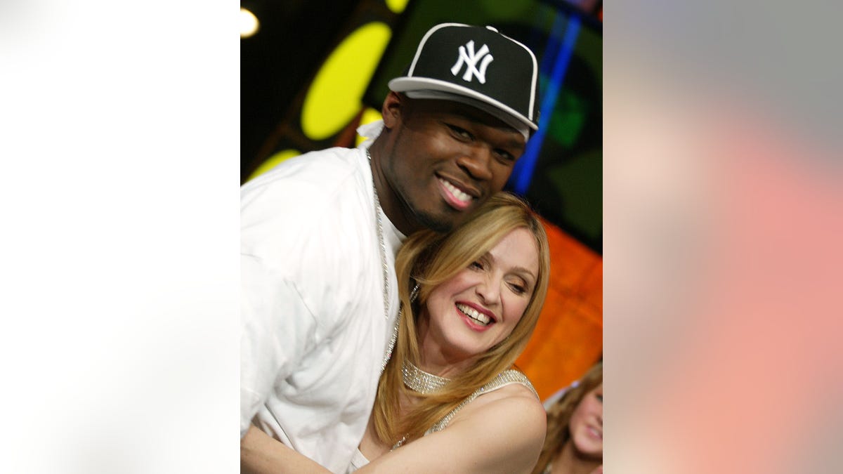 50 Cent and Madonna hugging
