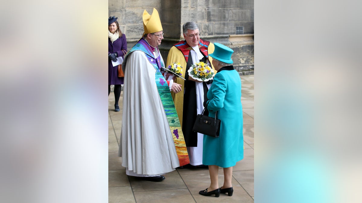 Queen Elizabeth greets Bishop of Oxford Steven Croft