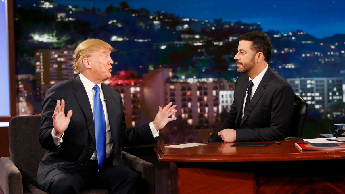 Donald Trump on "Jimmy Kimmel Live" in 2015 in a black suit and bright blue tie