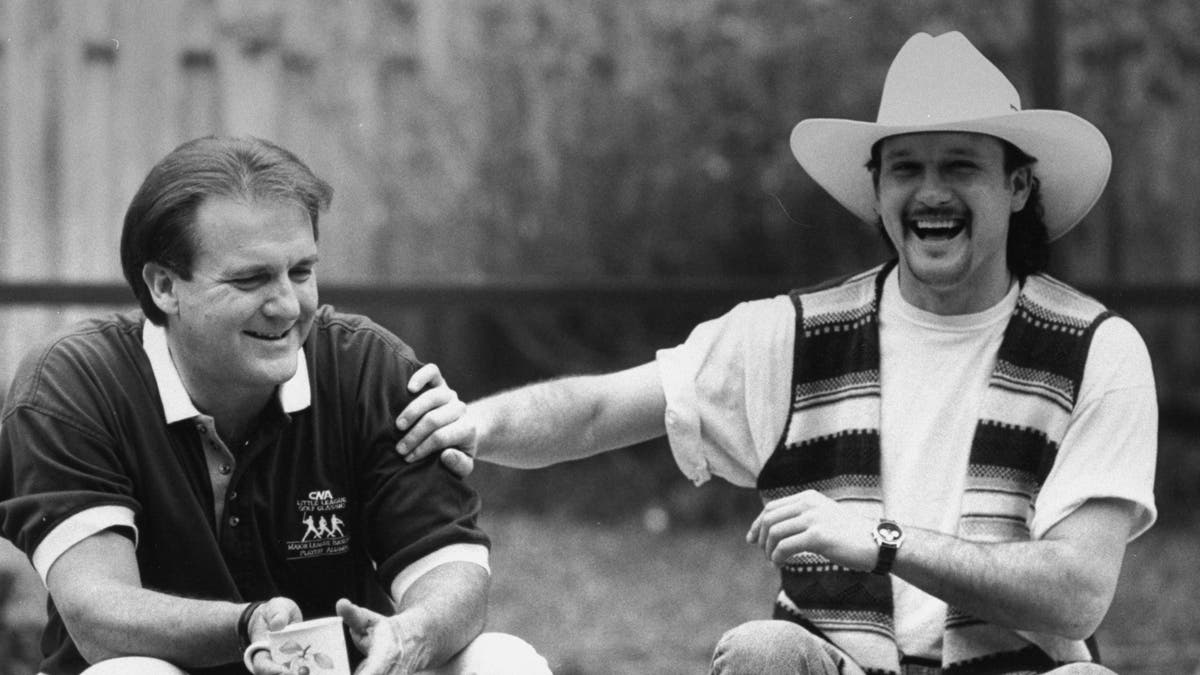 Tim McGraw laughing with his father Tug McGraw