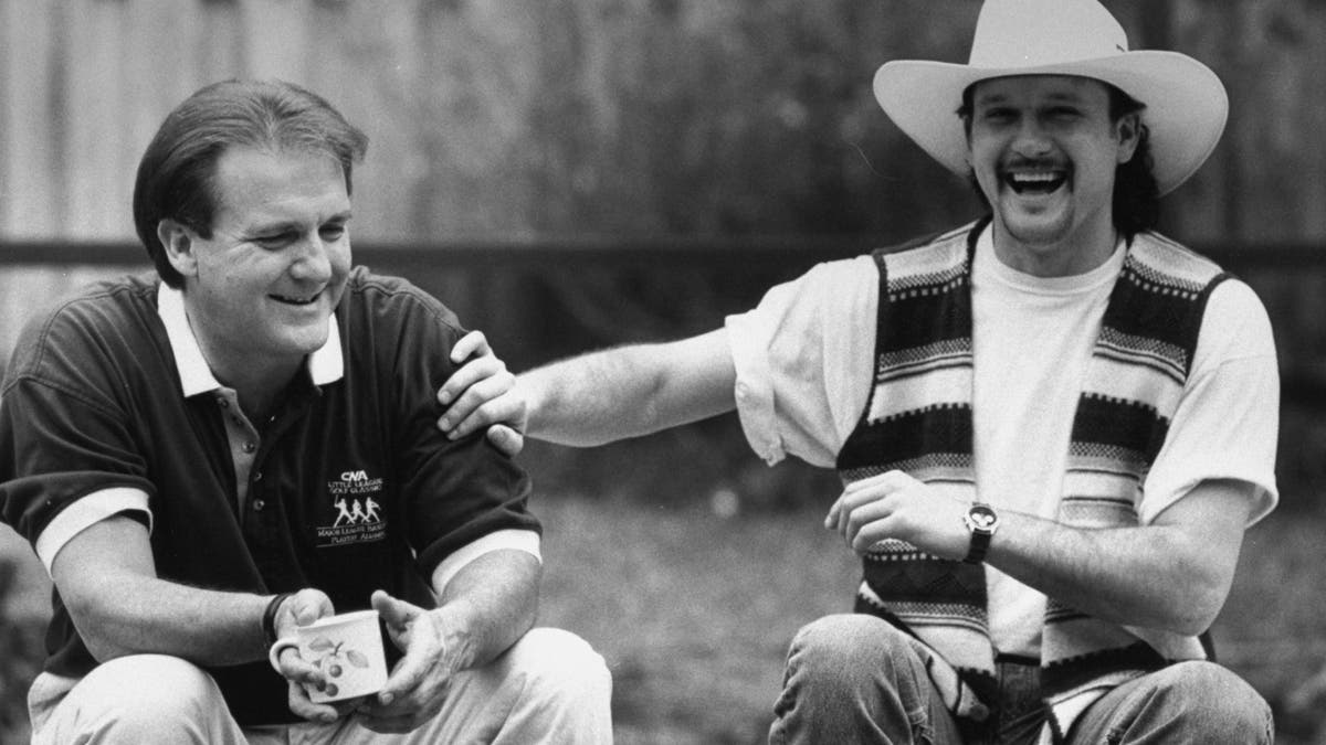 Tim McGraw laughing with his father Tug McGraw