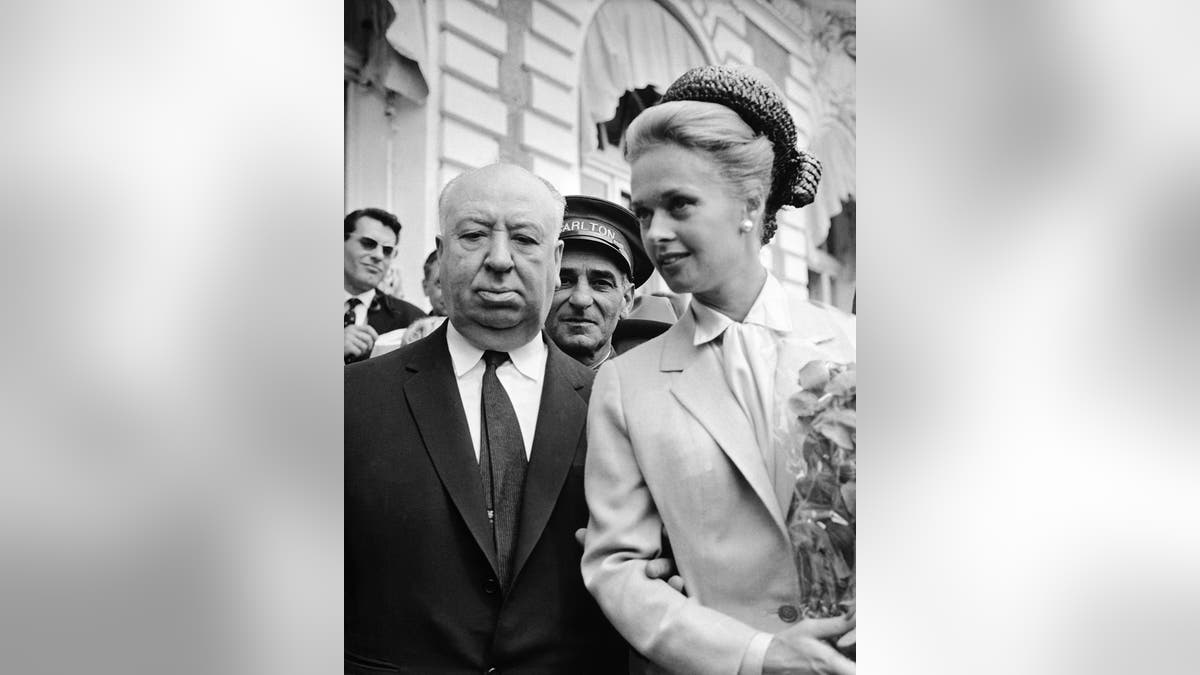 Alfred Hitchcock and Tippi Hedren at a press conference