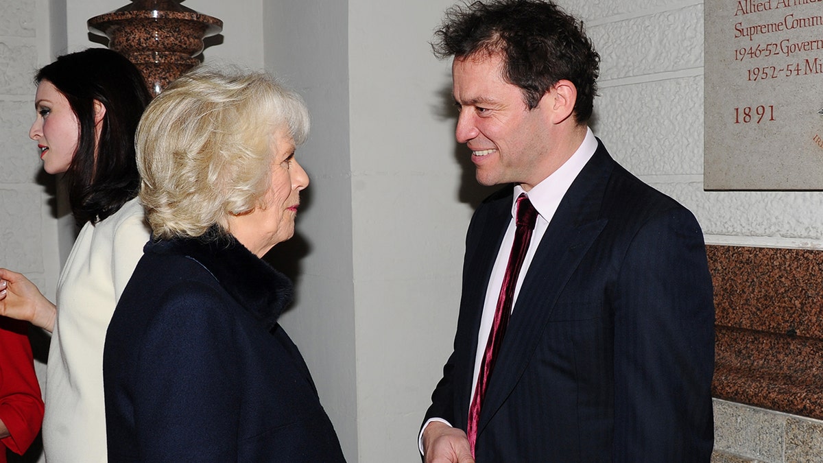 Dominic West and Camilla, Duchess of Cornwall attend the Maggie's Christmas Carol concert