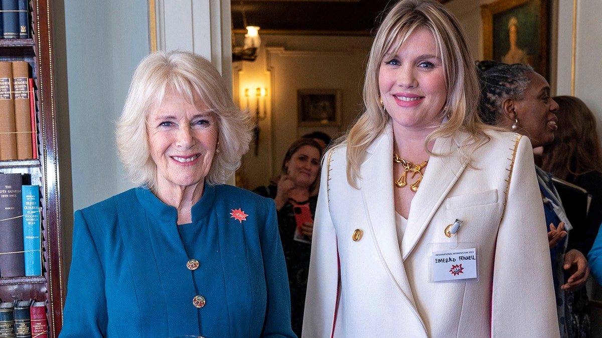 Britain's Camilla, Duchess of Cornwall and President of Women of the World Festival (L), meets actor Emerald Fennell,