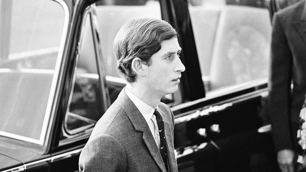 A young Prince Charles looking serious