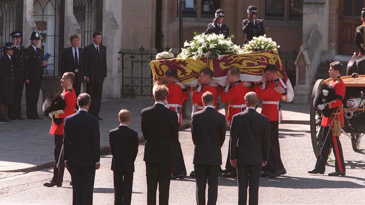 The Duke of Edinburgh, Prince William, Earl Spencer, Prince Harry and the Prince of Wales following the coffin of Diana, Princess of Wales