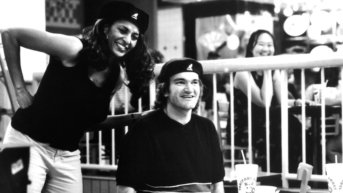 Actress Pam Grier and director Quentin Tarantino on the set of the Miramax movie "Jackie Brown"