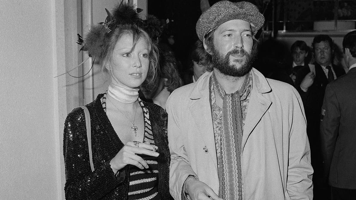 Eric Clapton and then-girlfriend Pattie Boyd attend a film premiere together.