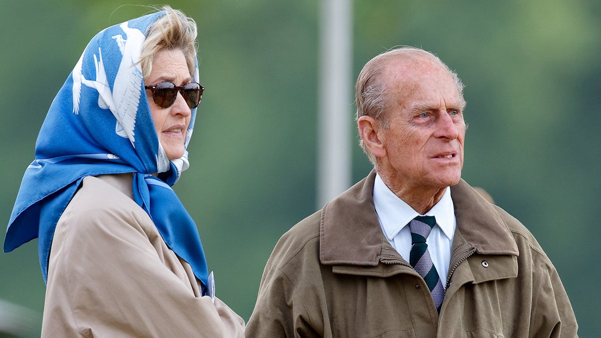 Prince Philip and Penelope Knatchbull watching polo