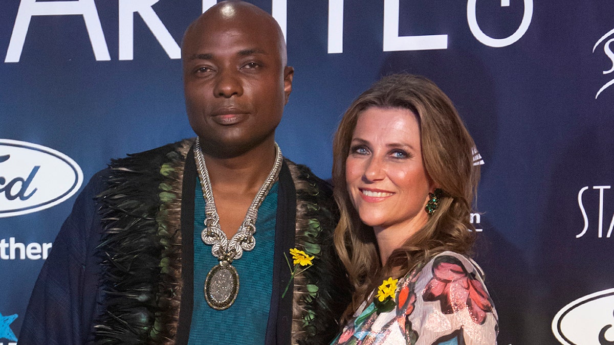 Shaman Durek and Princess Märtha Louise of Norway smiling at a gala