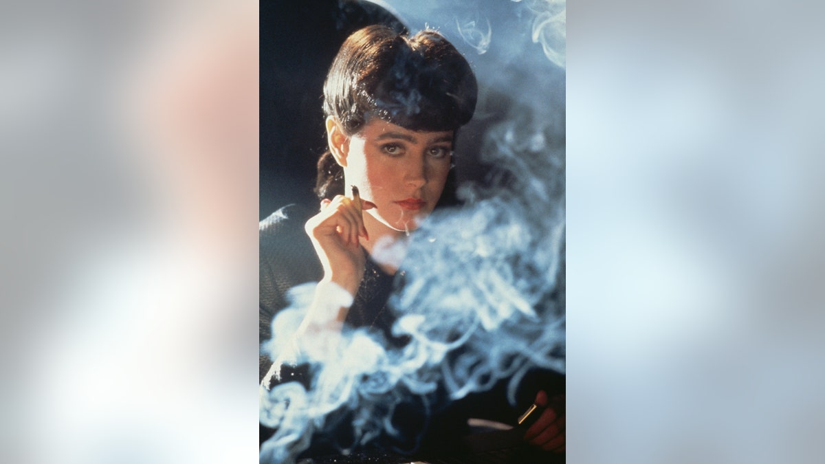 Sean Young smoking in character as Rachael