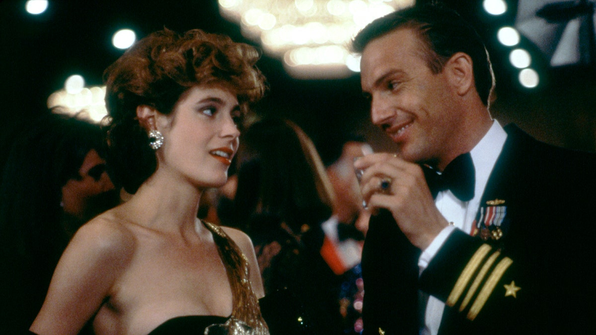 Sean Young chats with Kevin Costner
