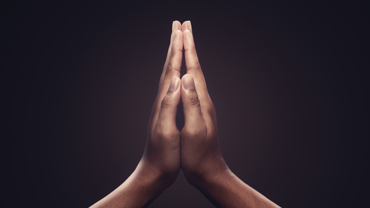 Hands in prayer