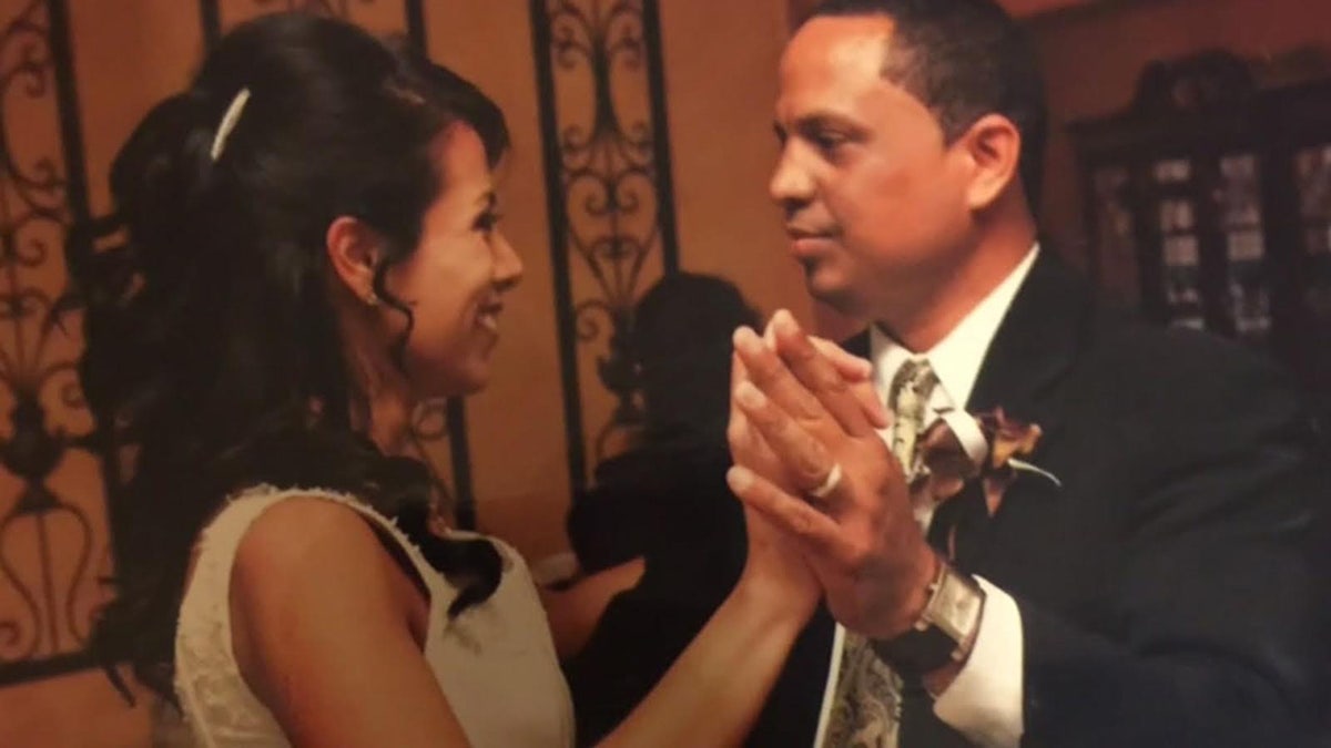 Ramon Sosa and his wife Lulu having their wedding dance