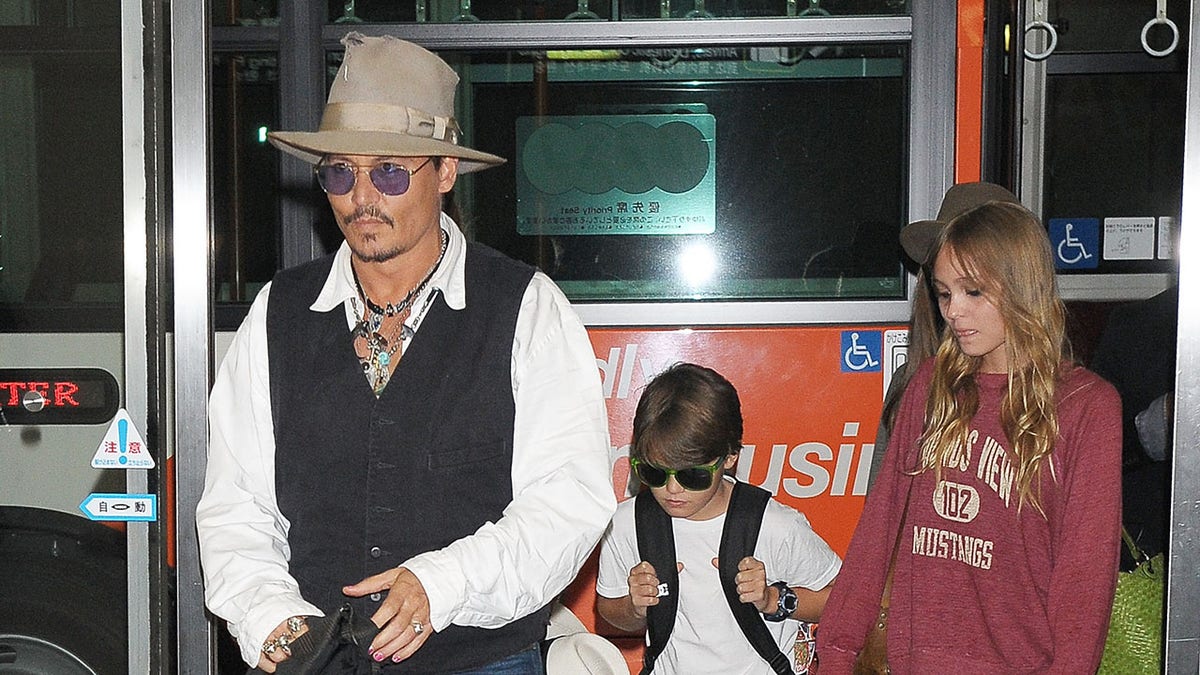 Johnny Depp with his kids in 2013.