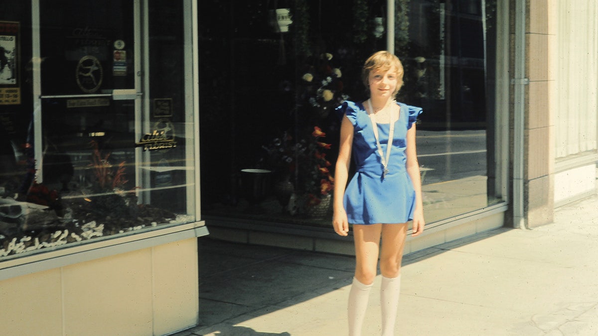 Jan Broberg standing in front of the camera