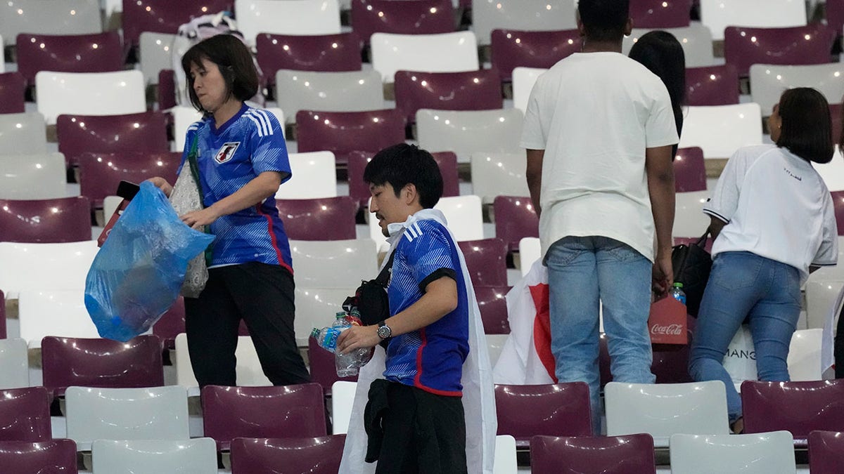 Japan fans clean up