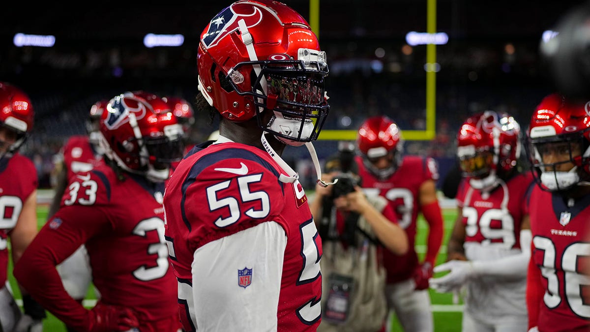 Jerry Hughes on the sideline