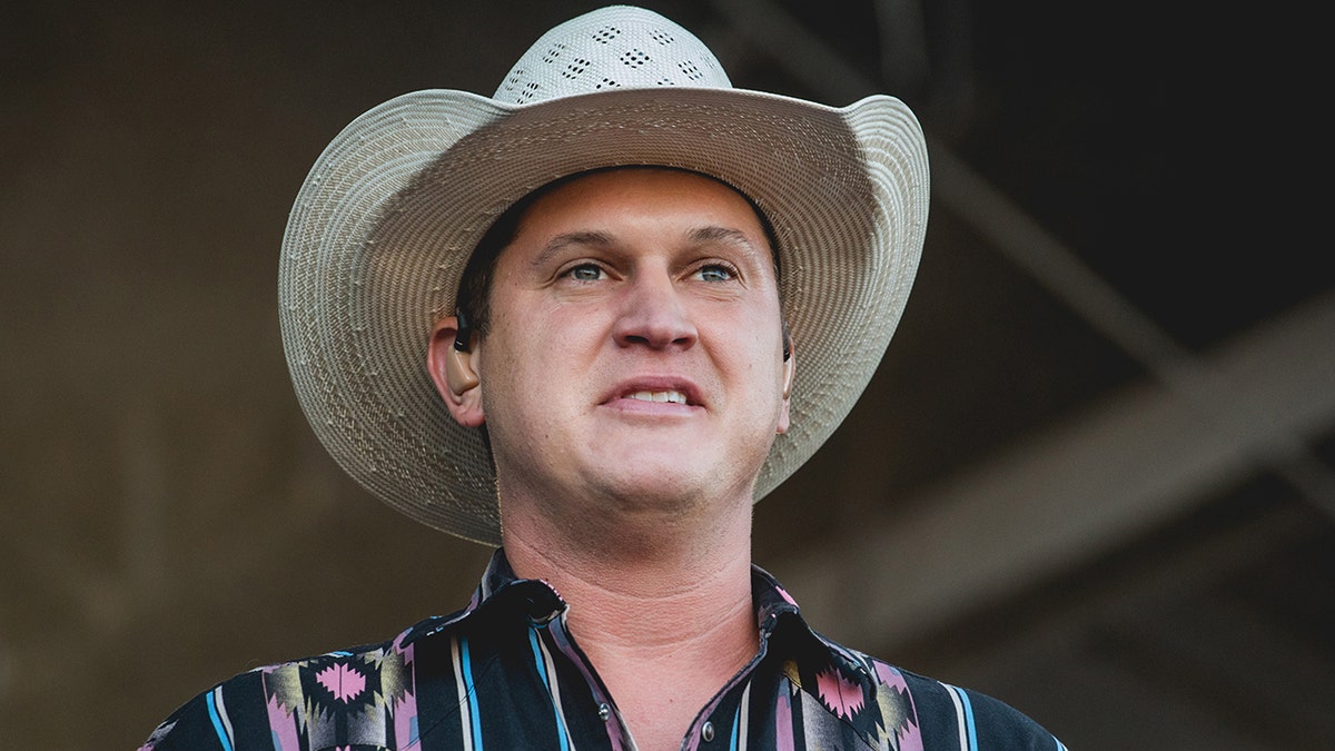 Jon Pardi singing at music festival