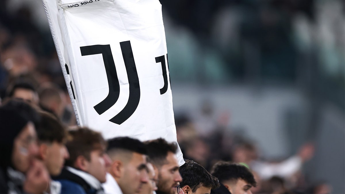 Fans hold Juventus sign