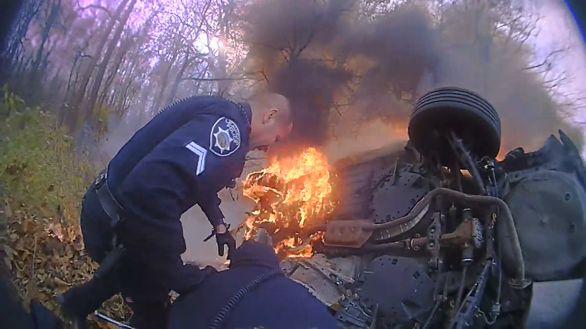 Kansas woman rescued burning vehicle