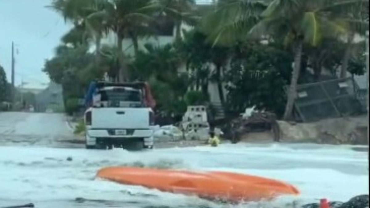 A kayak floats in the streets on Florida's Hutchinson Island