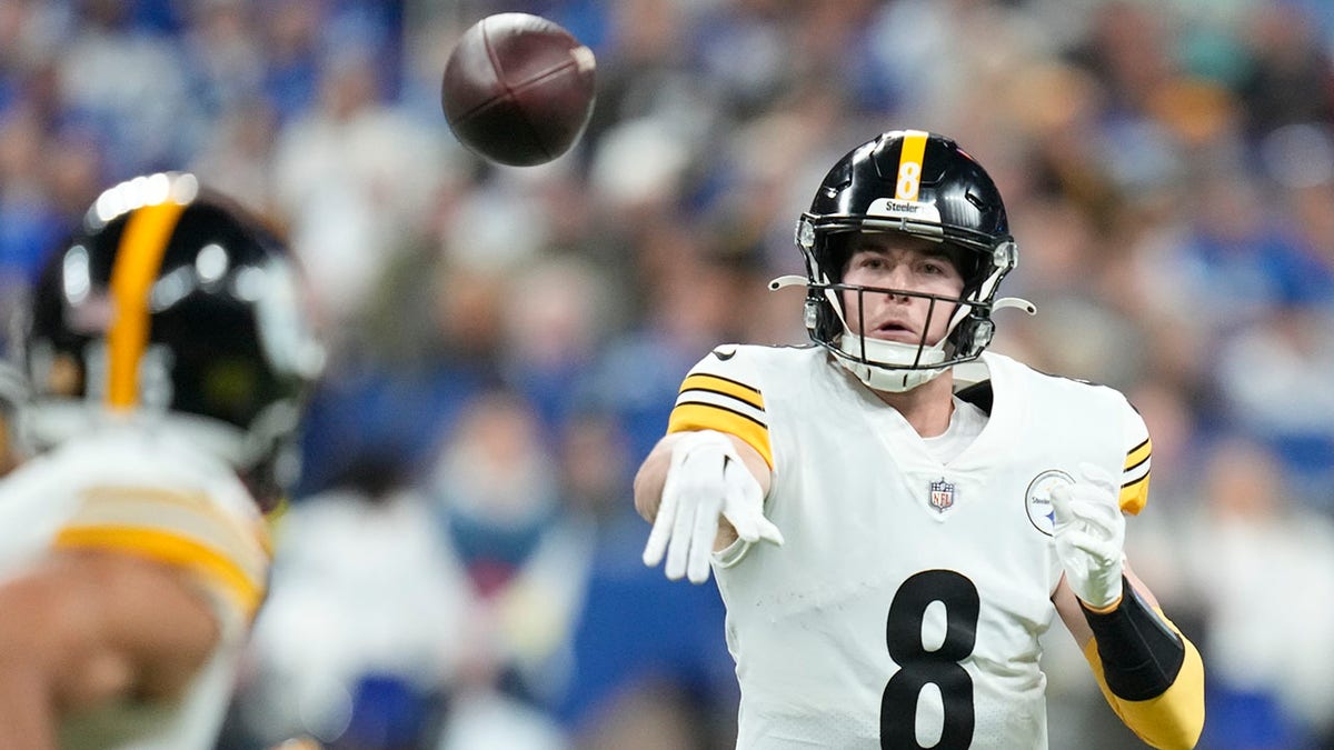 PITTSBURGH, PA - NOVEMBER 20: Pittsburgh Steelers quarterback Kenny Pickett  (8) calls a play in the huddle during the national football league game  between the Cincinnati Bengals and the Pittsburgh Steelers on