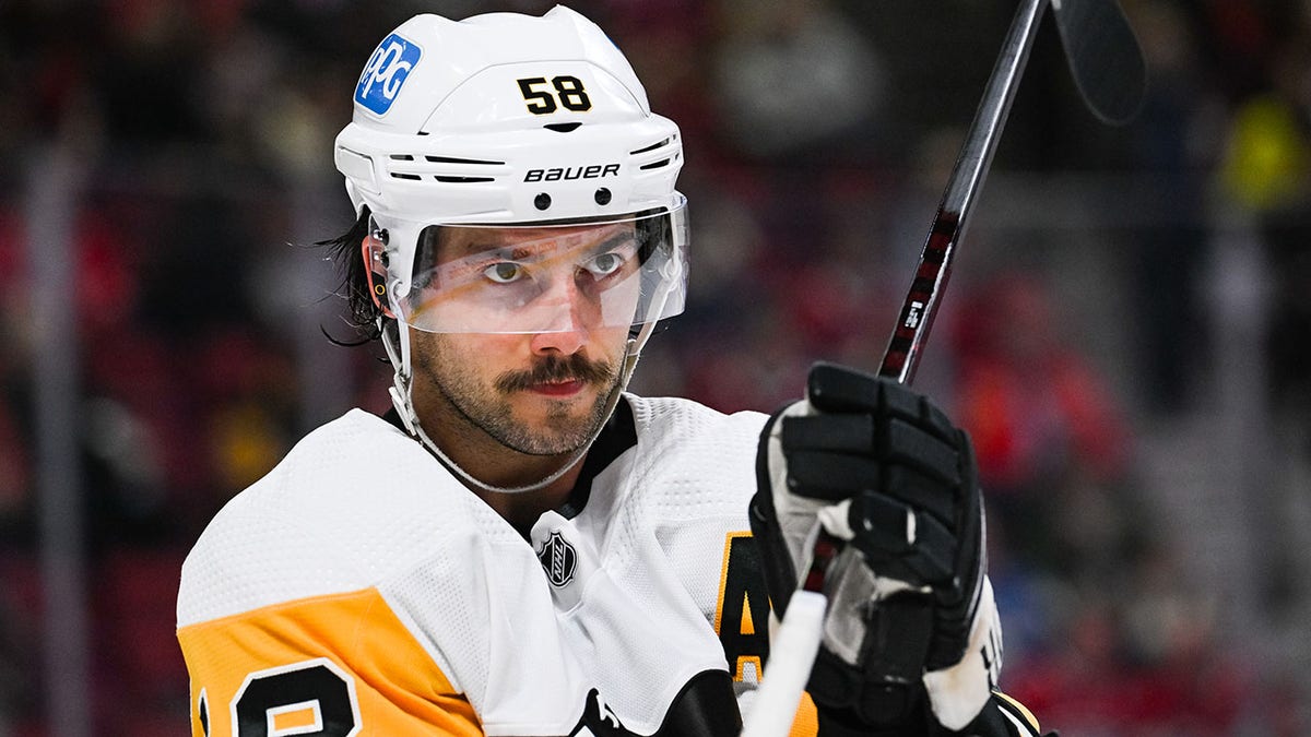 Kris Letang looks on