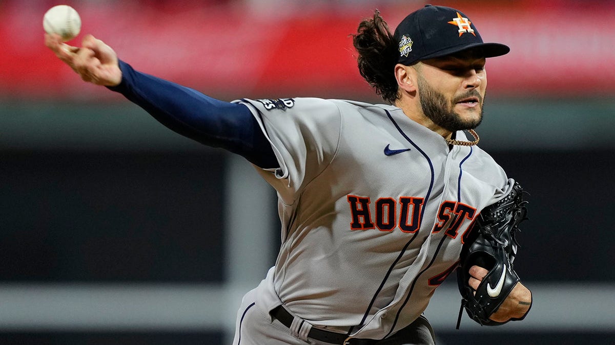 Lance McCullers throws a pitch