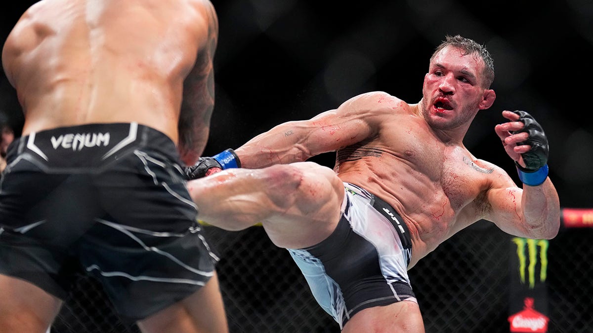 UFC 281 Dustin Poirier beats Michael Chandler in bloody brawl, calls him dirty mother----er after fight Fox News