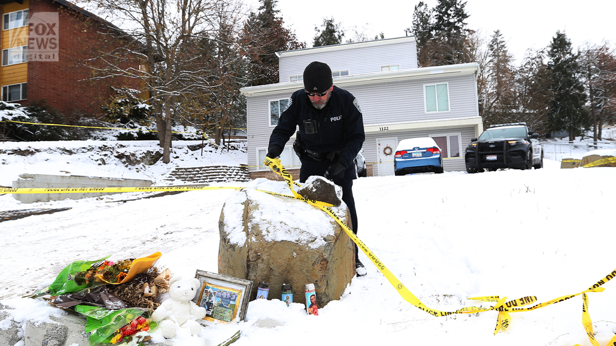 Memorial and crime scene tape outside Idaho home where students were killed