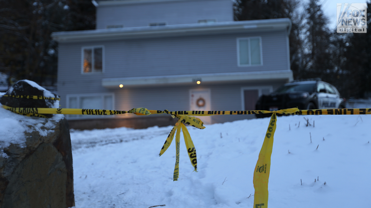 Crime scene tape outside of murder home