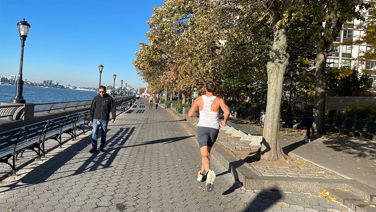 photo shows man running in NYC