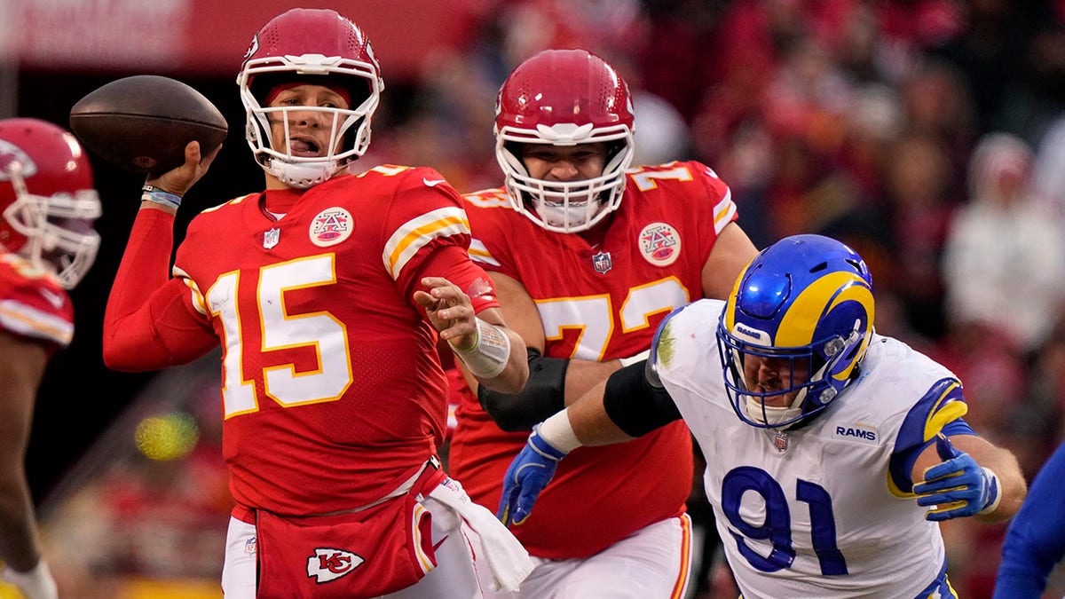 Patrick Mahomes looks to throw