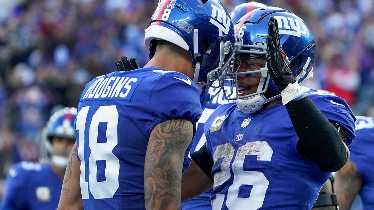 Saquon Barkley celebrates a TD