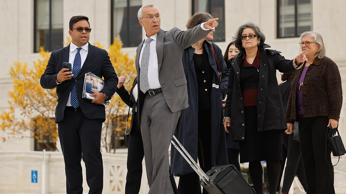 Attorney Seth Waxman, second from left, leaves the U.S. Supreme Court after oral arguments on Oct. 31, 2022, in Washington, D.C.