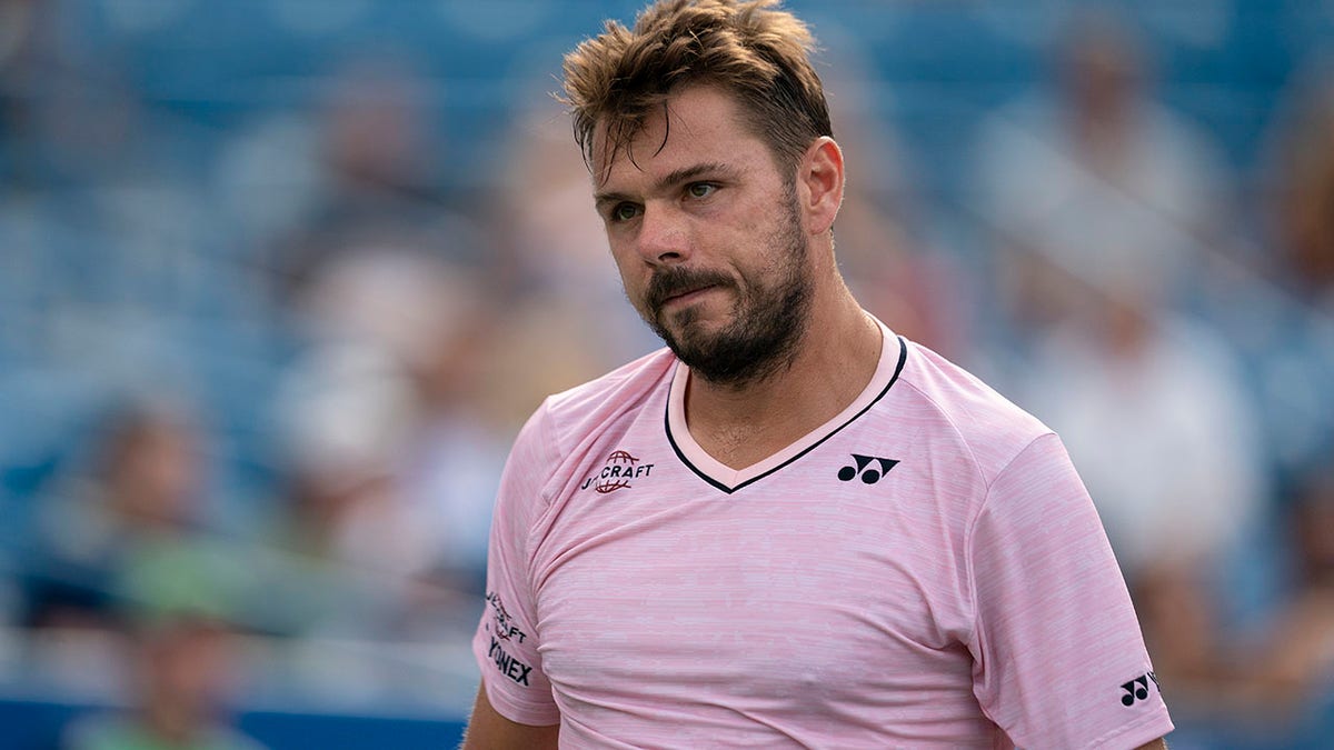 Stan Wawrinka walks off the court