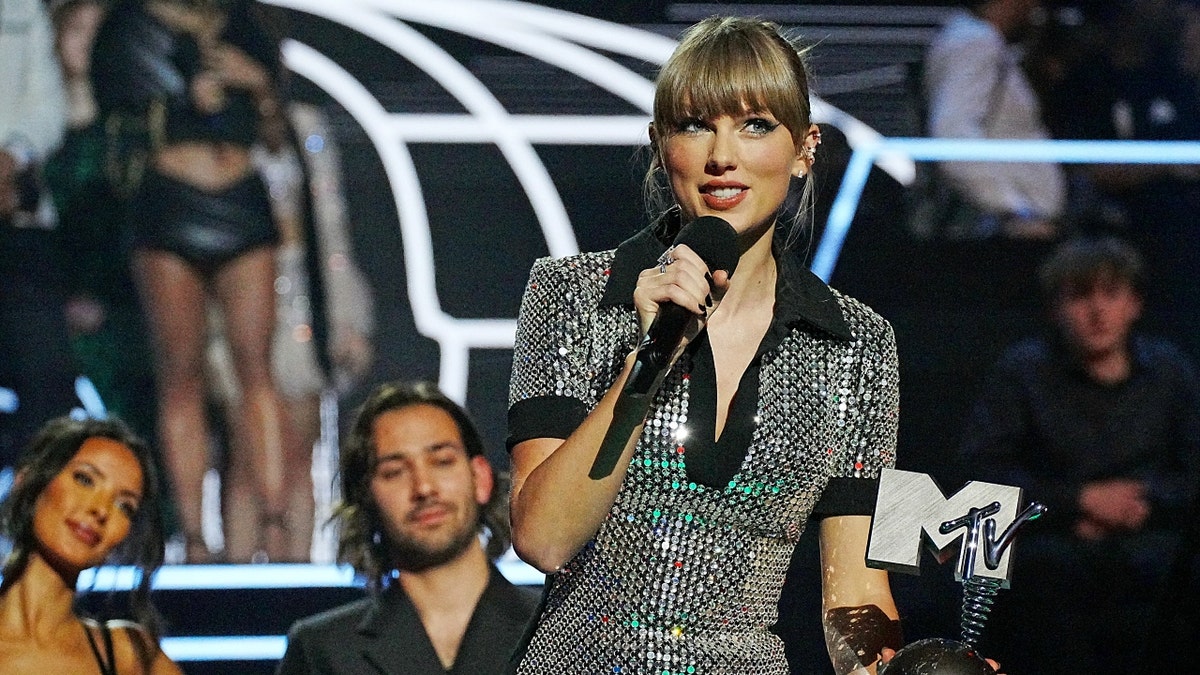 Taylor Swift accepts an award