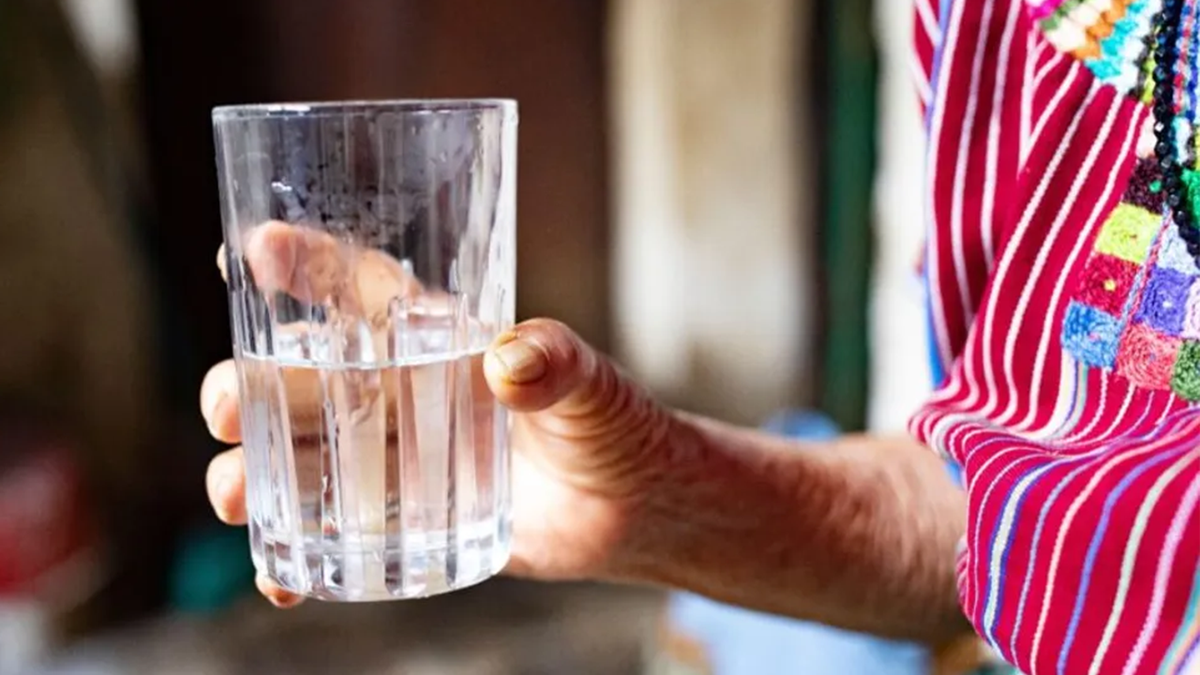 Woman holding tequila