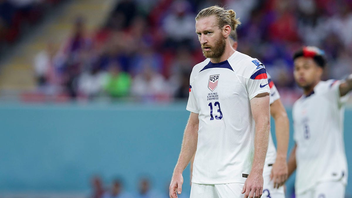 US men's soccer player looks on during World Cup match