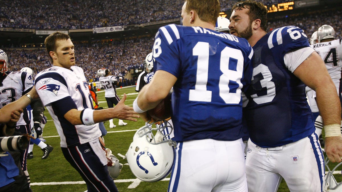 Tom Brady greets Jeff Saturday