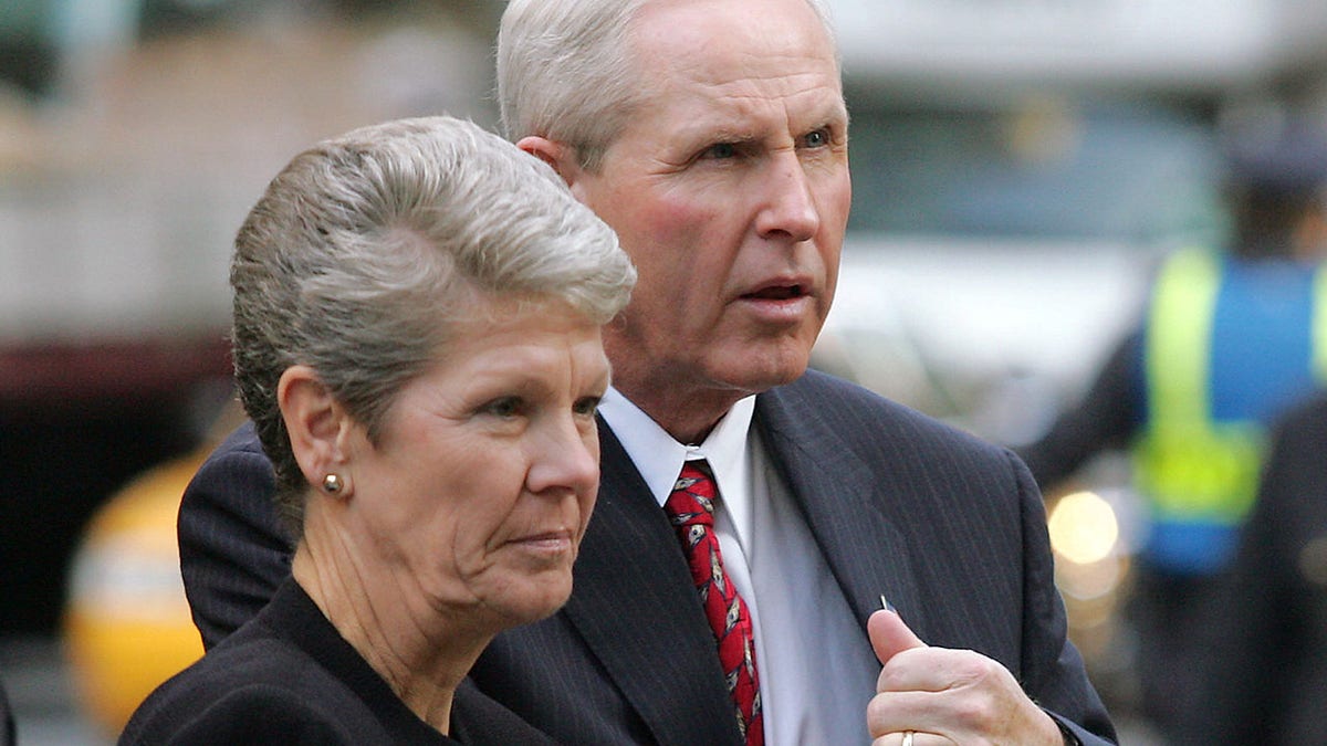 Tom and Judy Coughlin at a funeral