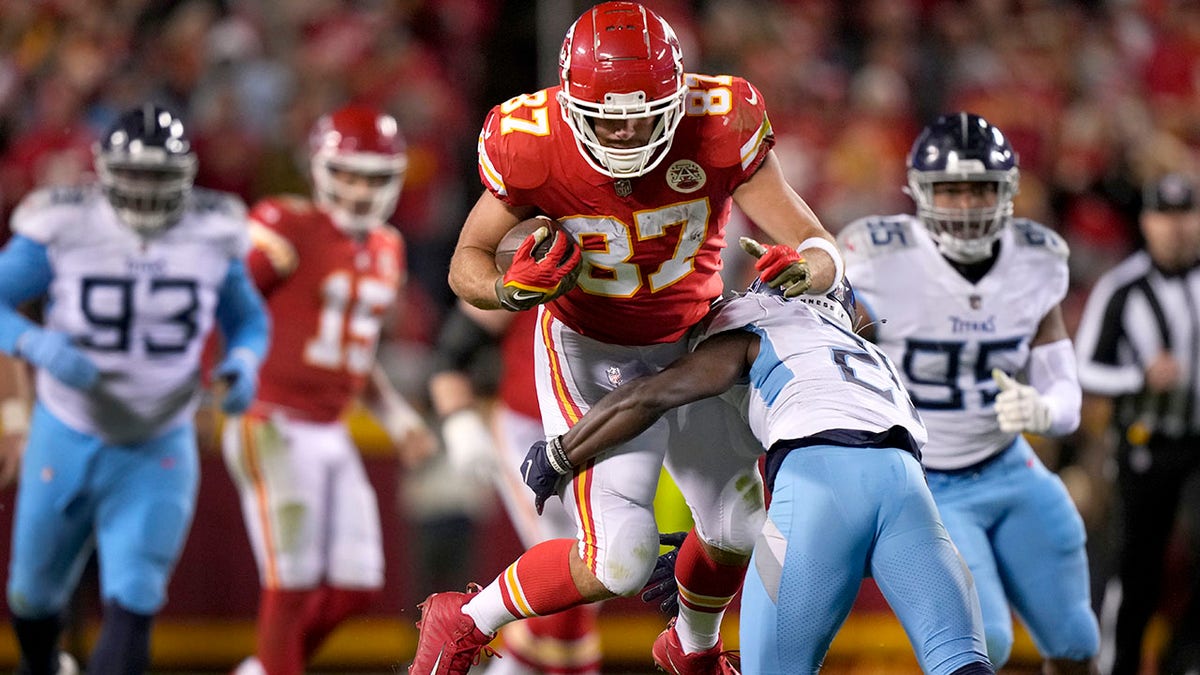 Travis Kelce is tackled