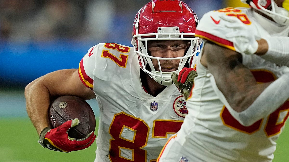 Travis Kelce looks for space